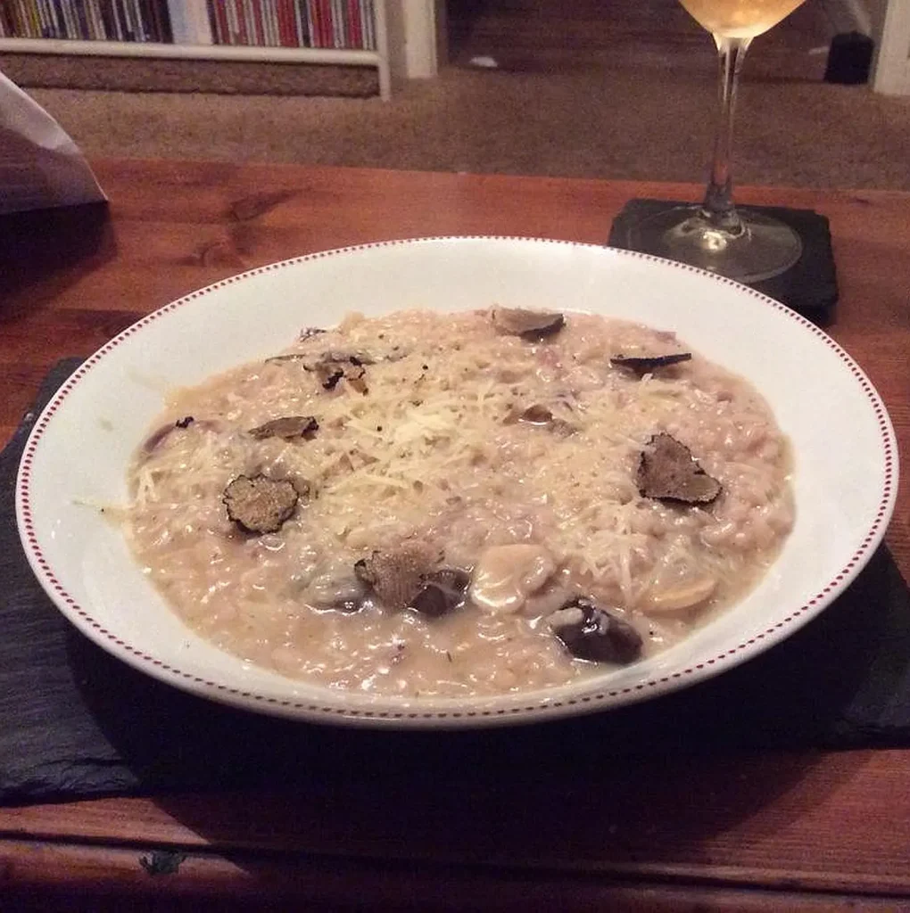 Mushroom risotto with shaved Dorset truffle and a glass of Furleigh fizz. Sylvia Collins